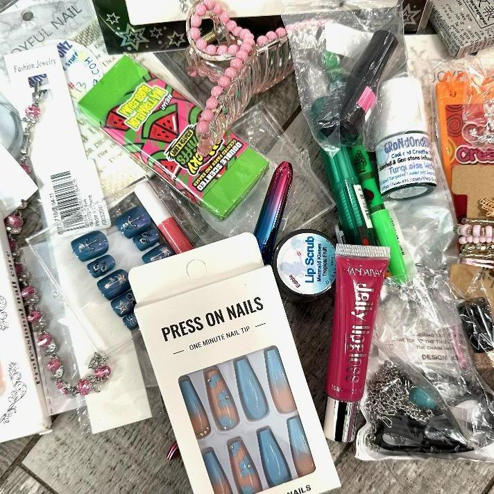 Flirt Scoop, Huge Scoop Of Fun Stuff, Totally Random, Makeup, Jewelry, Body Tattoos, Press-On Nails, Nail Decals, Lip Gloss, Lip Scrubs, Hair Clips, Crystal Barrettes, Beaded Pens, Scented Erasers, Etc.